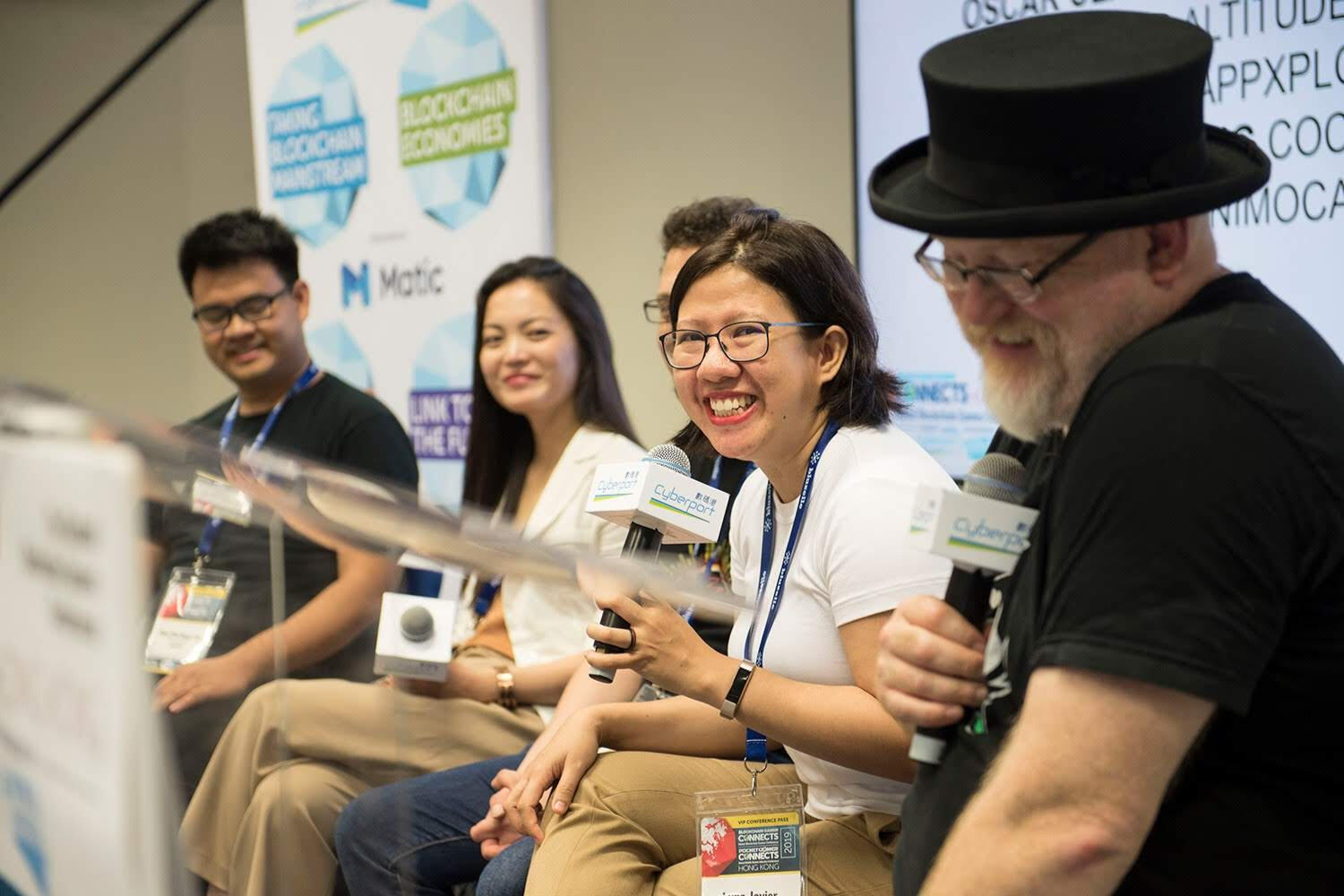 HK conference Luna Javier at a panel in a conference in Hong Kong